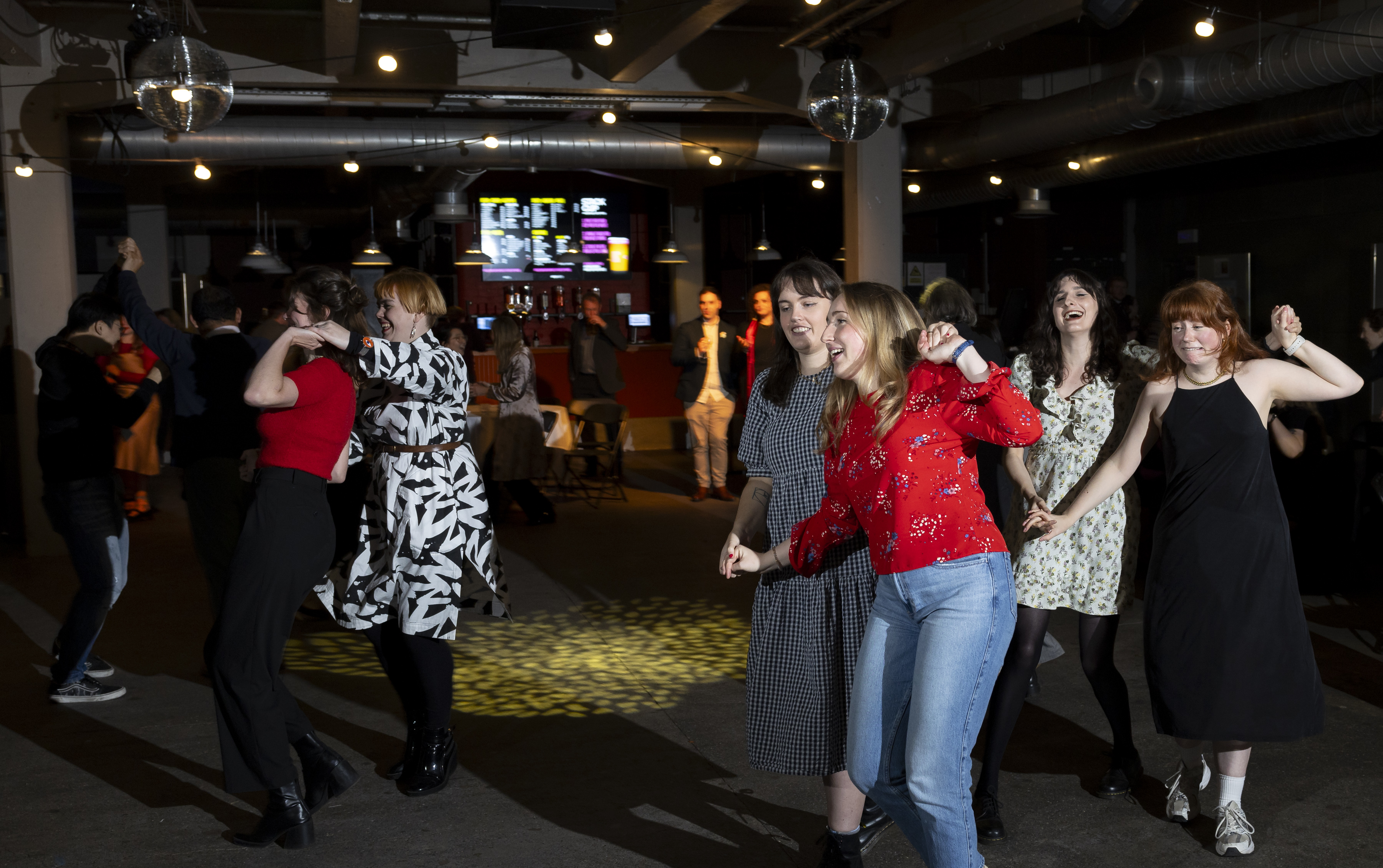 People dancing at a ceilidh