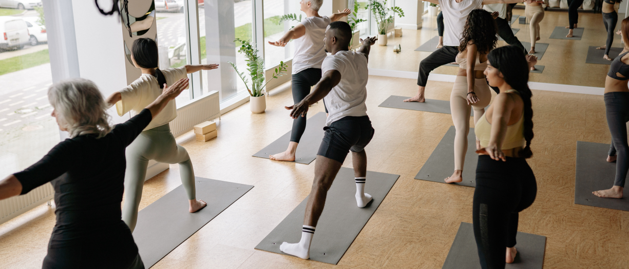 people doing yoga together