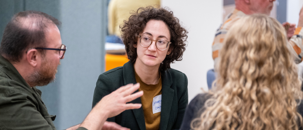 An academic supervisor having a conversation with a doctoral student