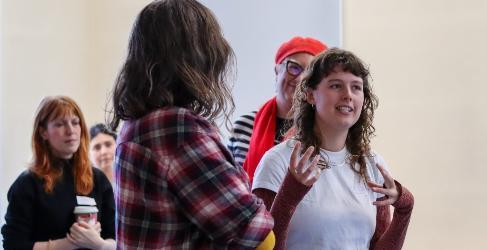 A group of participants engaging in a workshop discussion